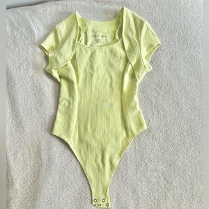 American Eagle yellow body suit. Size small.